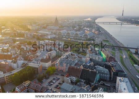 Riga, Latvia, Baltics. Aerial view photo from flying drone panoramic  to Old Riga Town on the background of the Daugava River and downtown on a beautiful early morning
