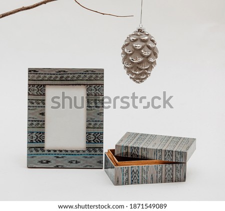 Beautiful Christmas decoration with a photo frame isolated on a white background