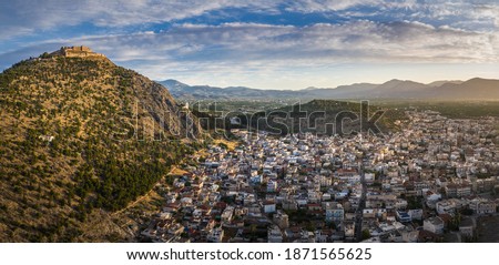 The castle on Larissa Hill, located near the town of Argos, Greece on sunrise light aerial view Royalty-Free Stock Photo #1871565625