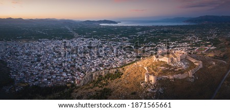 The castle on Larissa Hill, located near the town of Argos, Greece on sunrise light aerial view Royalty-Free Stock Photo #1871565661