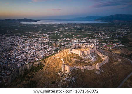 The castle on Larissa Hill, located near the town of Argos, Greece on sunrise light aerial view Royalty-Free Stock Photo #1871566072