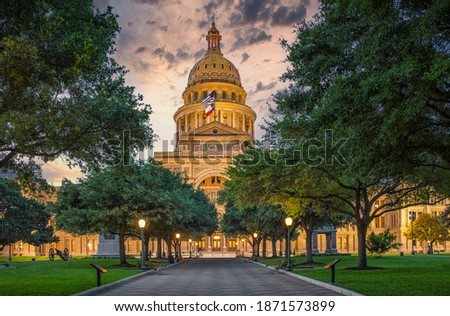 Austin State Capitol with beautiful yellow sunset Royalty-Free Stock Photo #1871573899