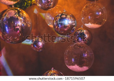 Decoration interior elements of restaurant venue banquet hall with multicoloured different helium balloons, on a indoor corporate event or wedding reception or birthday party celebration Royalty-Free Stock Photo #1871596507
