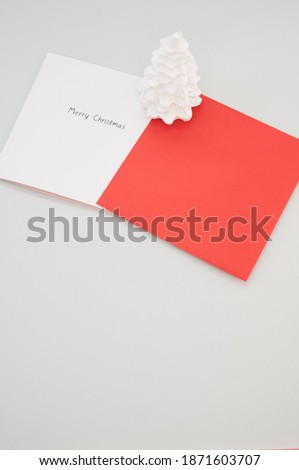 A closeup shot of Christmas wishing cards on the table