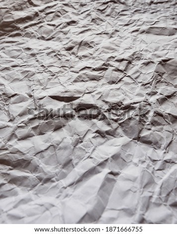 Crumpled white paper background, texture