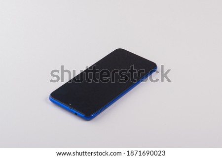 Old smartphone on a white isolated background