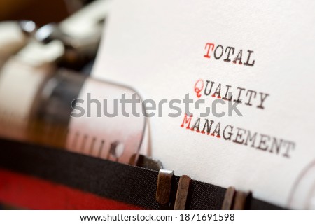 Total quality management phrase written with a typewriter. Royalty-Free Stock Photo #1871691598