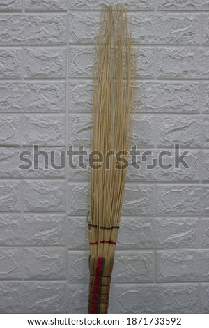 Broom stick, is a tool for cleaning made of sticks (coconut leaf stalks).