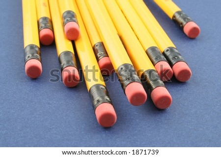Yellow pencils on a blue background
