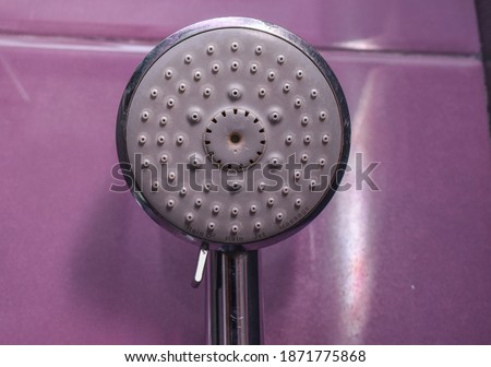 Designer Chrome Hand Shower Spray with Turn Lever of Spray Settings. Modern Bathroom Shower Accessories. Stainless Steel Handshower. Round three Functions Shower Handset front view