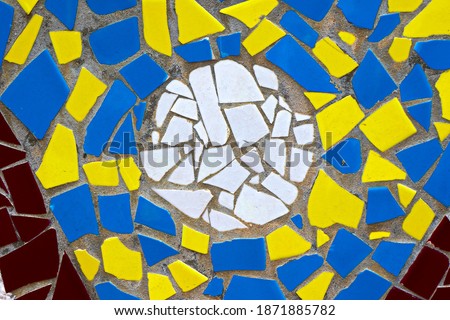 white round and blue . yellow colorful mosaic tiles wall