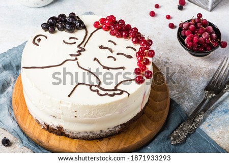 St. Valentine's Day, Mother's Day, Birthday Cake. festive dessert. Woman's day cake. Cake for valentines day. Valentines dessert. Cheesecake with berries. Love. Kissing figures. Royalty-Free Stock Photo #1871933293