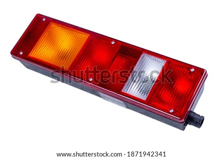 isolated truck taillight. Rear light of a truck isolated on white background.
