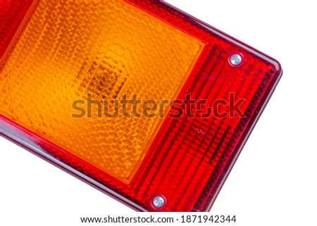 isolated truck taillight. Rear light of a truck isolated on white background.