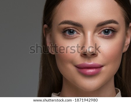 Beautiful woman face with beautiful eyes and lips