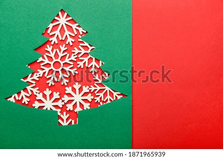 Beautiful card with Christmas tree cut from paper