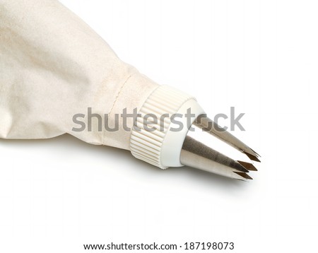 Cotton icing bag and nozzle on white background