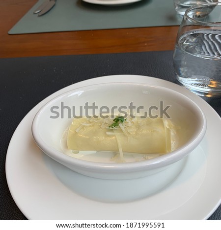 a luxurious lasagna with plenty of cream and cheese. A picture of the concept taken above.