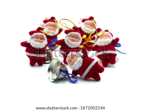 a lot of toy santas on a white background