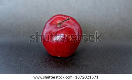 red Apple on a gray background