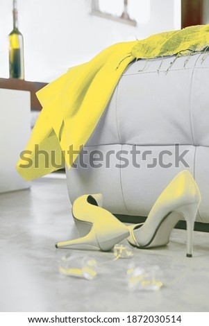 Love story. Female stylish fashion outfit: yellow dress, shoes in interior background with wine. Valentine's Day or Christmas New Year Party concept.  Bright illuminating yellow and gray colours.