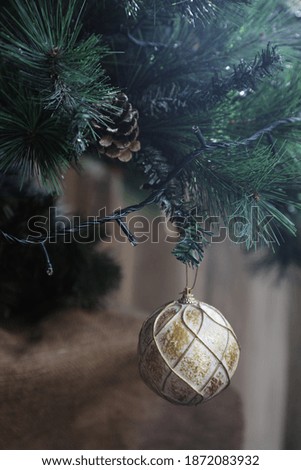 Ornament on green Christmas tree 