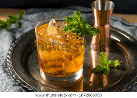 Boozy Refreshing Stinger Cocktail with Mint and Brandy Royalty-Free Stock Photo #1872086950