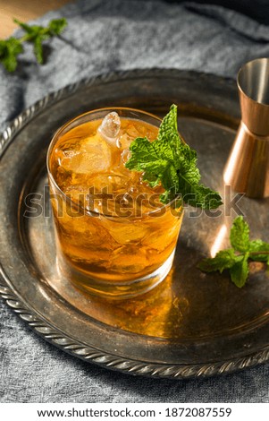 Boozy Refreshing Stinger Cocktail with Mint and Brandy Royalty-Free Stock Photo #1872087559