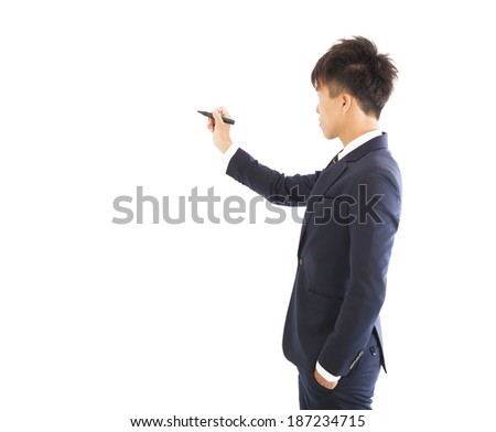 businessman holding a pencil to draw something