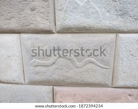 SNAKE IN WALL -  STONE ARCHITECTURE