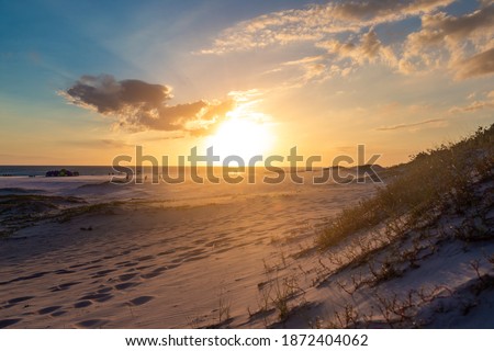 The most beautiful sunset in Praia Grande beach. Arraial Do Cabo, Rio de Janeiro, Brazil.