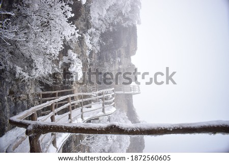 climb mountain with snow bridge and snow way