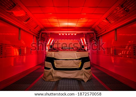 Paint Spray Booth Automotive with Infrared Heater Lamp. Paint Curing Light Royalty-Free Stock Photo #1872570058