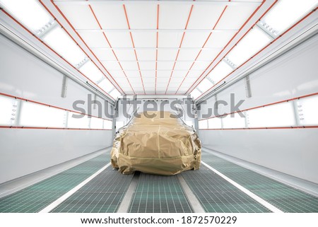 Paint Spray Booth Automotive with Infrared Heater Lamp. Paint Curing Light Royalty-Free Stock Photo #1872570229
