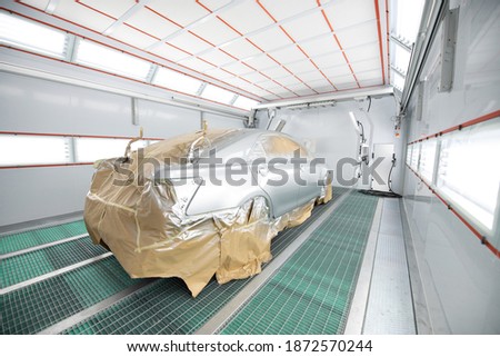 Paint Spray Booth Automotive with Infrared Heater Lamp. Paint Curing Light Royalty-Free Stock Photo #1872570244