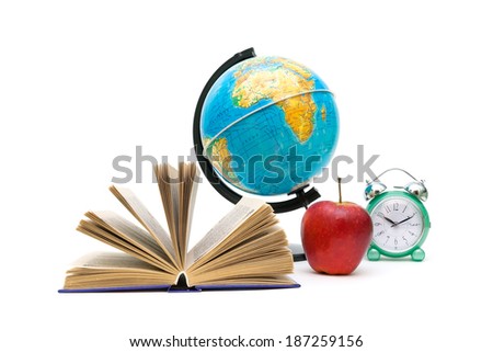 open book, red apple, globe and alarm clock on white background. horizontal photo.