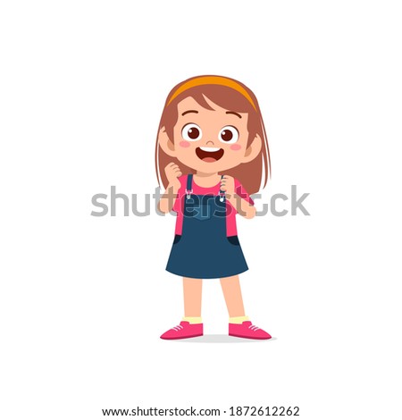 cute little kid girl show happy and friendly pose expression Royalty-Free Stock Photo #1872612262