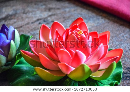 Picture of artificial pink color lotus flower. use for home decoration.