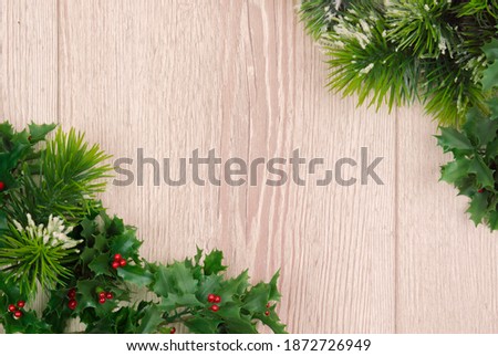 Festive background.Christmas decoration , tree branches. Copy space. traditional decorative ornament. Fir tree , pine cones on wooden table. Space for a greeting message. Christmas card. Top view
