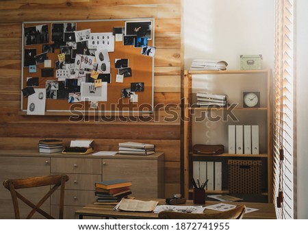 Detective office interior with evidence board on wall