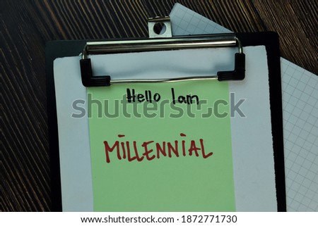 Hello I am Millennial write on sticky notes isolated on Wooden Table.