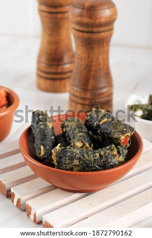 Selected Focus Kimmari or Gimmari, Korean Fried Snack Tempura Made from Seaweed (Laver) Roll Stuffed with Glass Noodle or Japchae. Usually Served with Tteokbokki as Side Dish