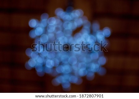 defocus light snowflake. Blue Festive Christmas elegant abstract background. bokeh lights 