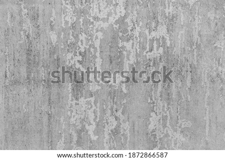 Ultimate gray concrete wall with scratches and cracks. Textured background. Color of the year 2021.