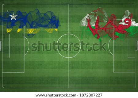 Curacao vs Wales Soccer Match, national colors, national flags, soccer field, football game, Competition concept, Copy space