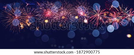 Colorful firework with bokeh background. New Year celebration, Abstract holiday background
