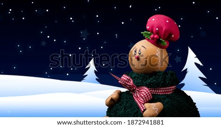Gingerbread man postcard in valley with snow
