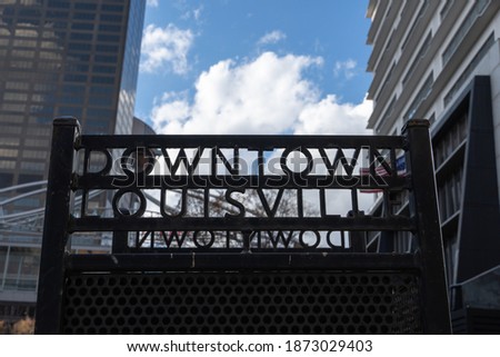 Downtown Louisville signage on the street of Whiskey Row in downtown Louisville Kentucky