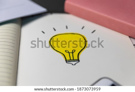 Hand painted light bulb, financial idea