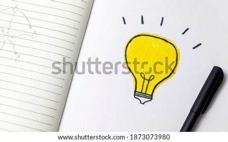 Hand painted light bulb, financial idea
